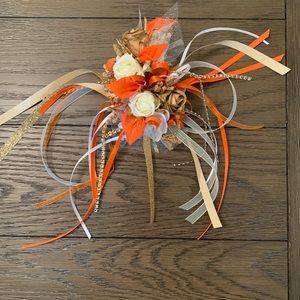 NEW Corsage. Orange, white, and gold in color.